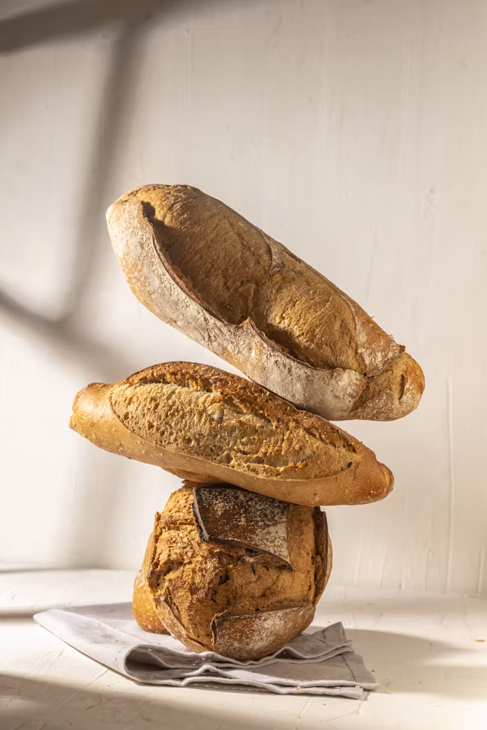 Rustic bread cooked crispy with the loaves stack on each other 